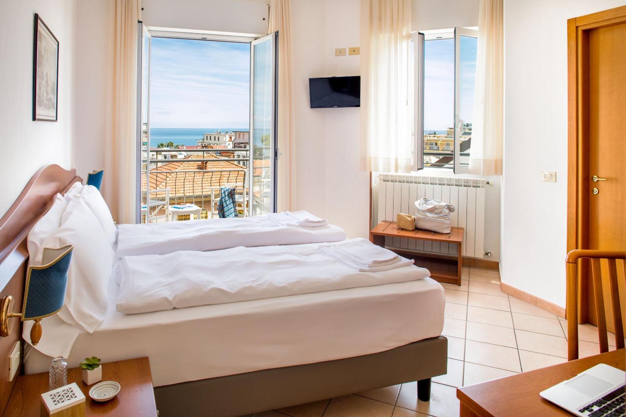 לאיגואליה Hotel Tritone מראה חיצוני תמונה