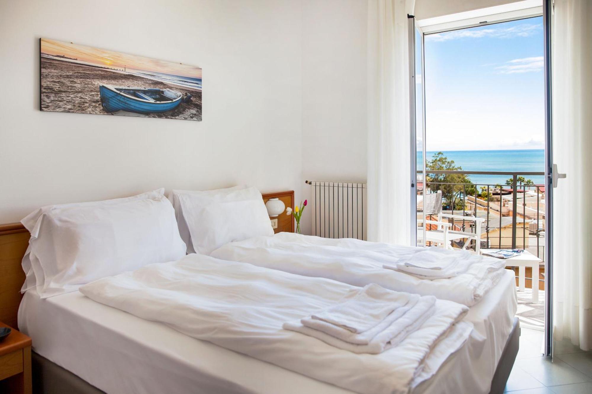 לאיגואליה Hotel Tritone מראה חיצוני תמונה