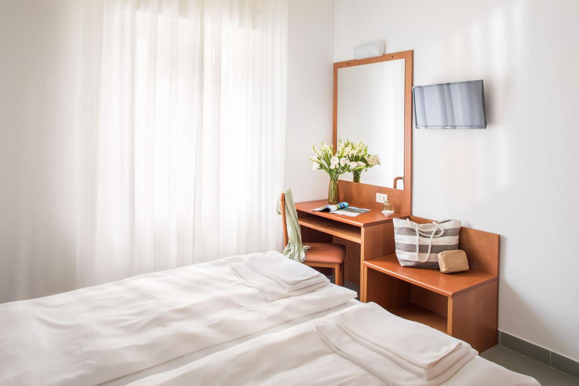 לאיגואליה Hotel Tritone מראה חיצוני תמונה