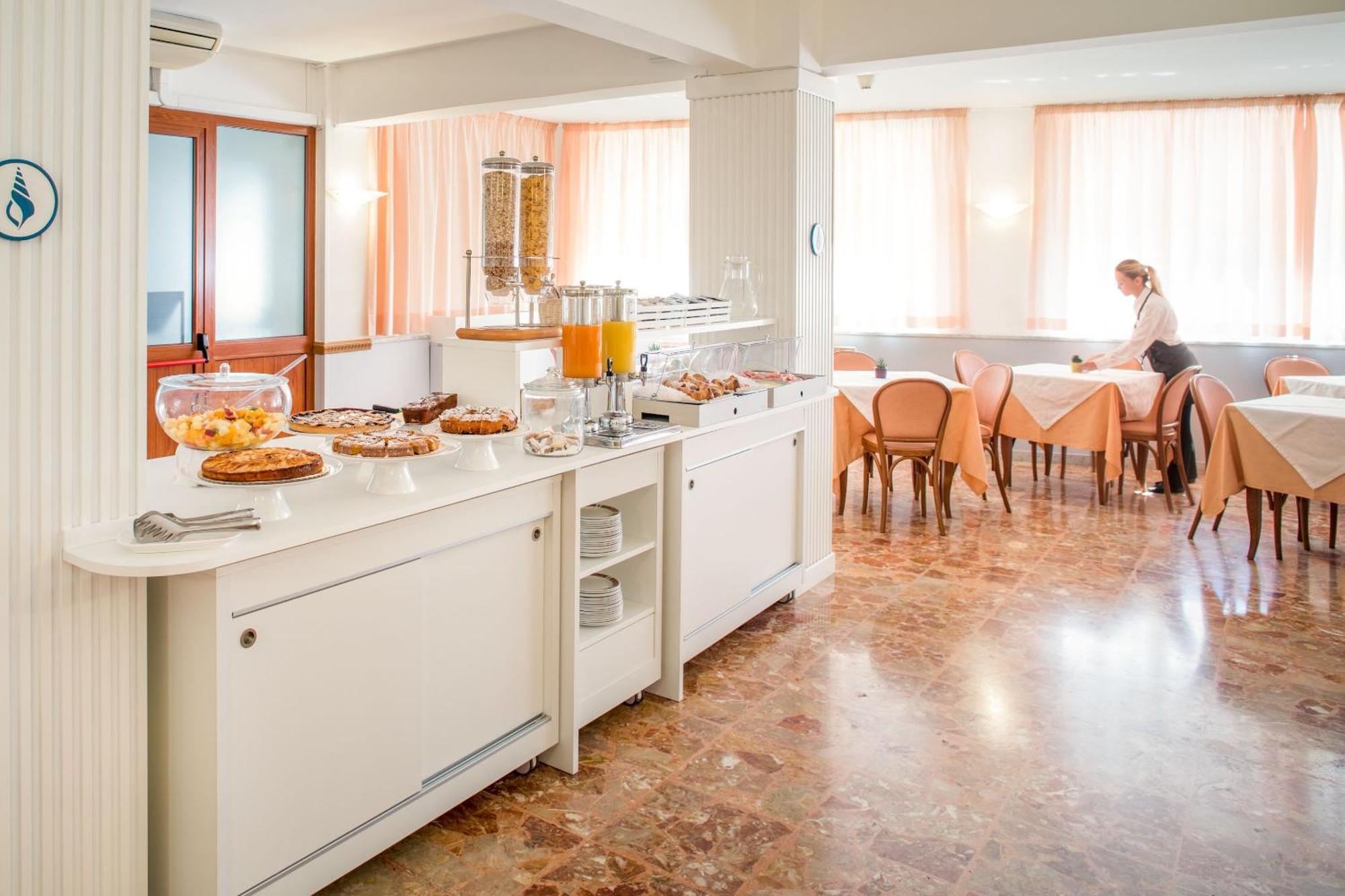 לאיגואליה Hotel Tritone מראה חיצוני תמונה